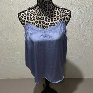 Lilac color tank top to wear alone or under blazers has adjustable straps